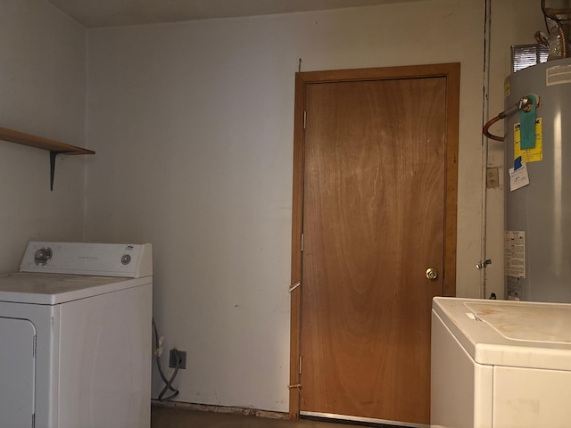 washroom with washer / dryer and gas water heater