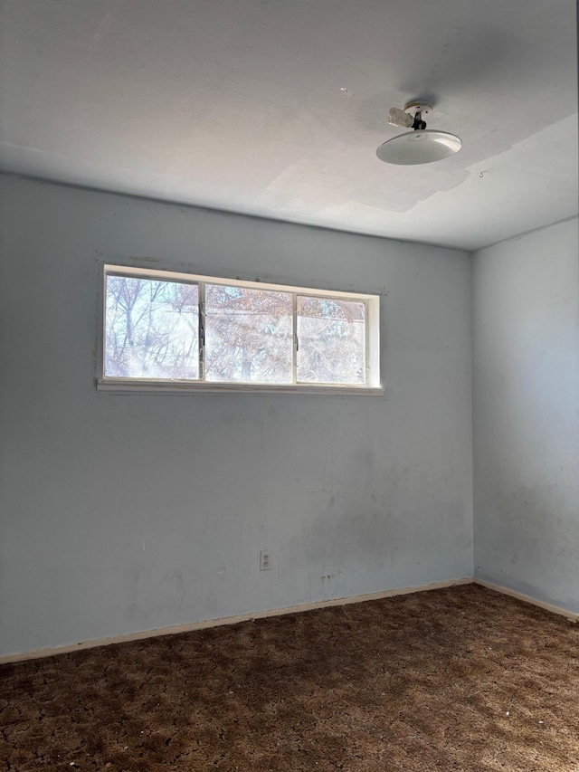 empty room with carpet flooring