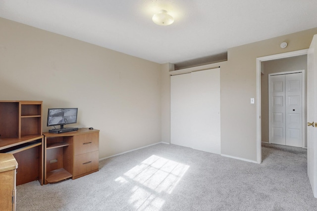 office space with light colored carpet