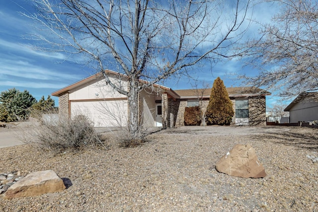 ranch-style home with a garage