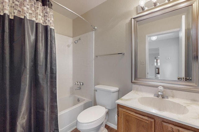 full bathroom with toilet, vanity, and shower / bath combo with shower curtain