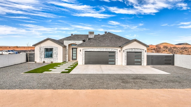 french country home with a garage