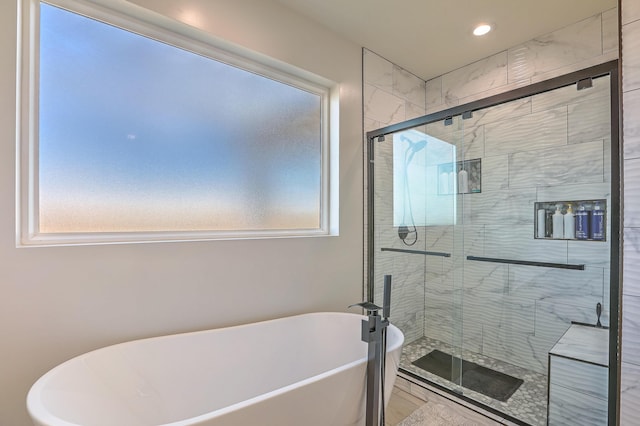 bathroom with independent shower and bath