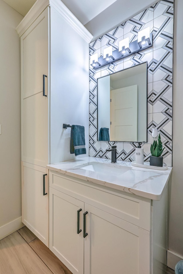 bathroom featuring wood-type flooring and vanity