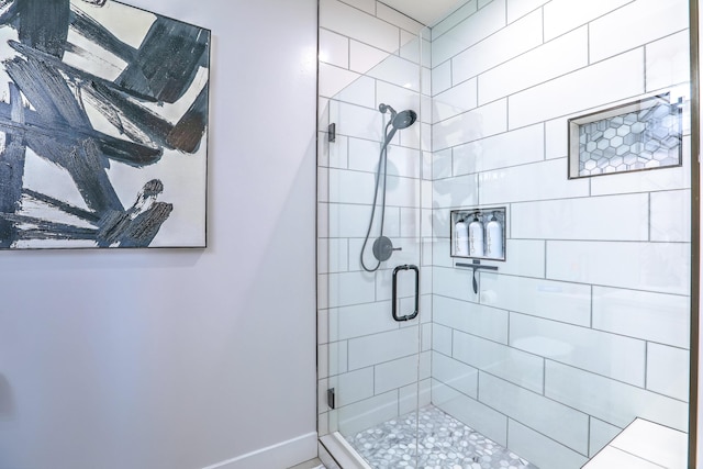 bathroom featuring an enclosed shower