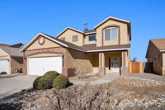 view of front of property with a garage