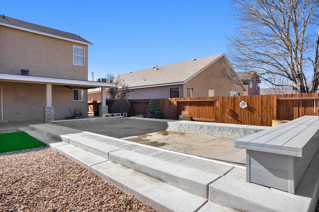 rear view of house with a patio