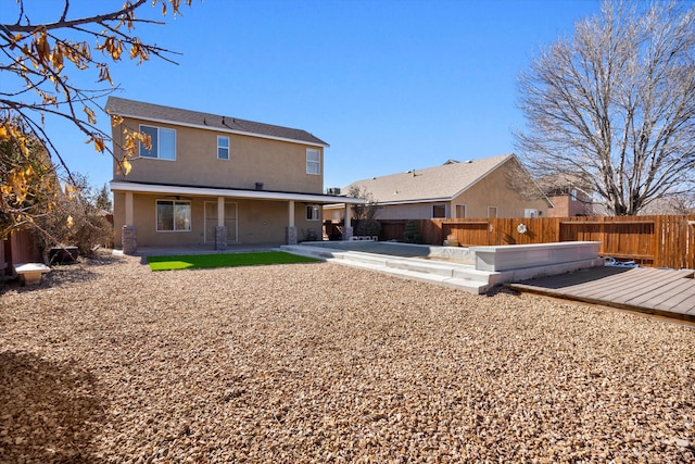 rear view of house with a patio area