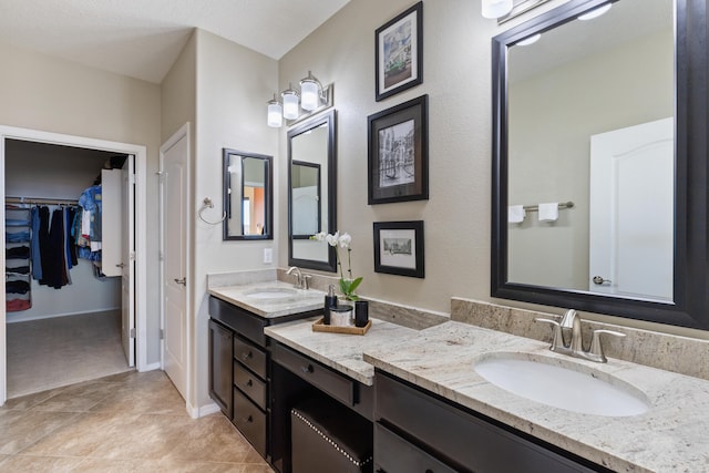 bathroom featuring vanity and tile patterned flooring