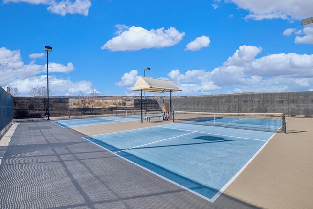 view of tennis court with basketball court