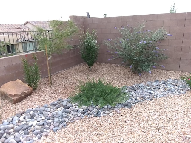 view of yard with a fenced backyard