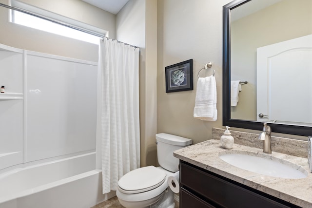 full bathroom featuring toilet, vanity, and shower / bath combination with curtain