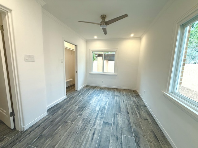 unfurnished bedroom with crown molding, ceiling fan, and dark hardwood / wood-style floors