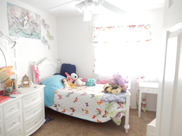 6456 Ja Ct NW, Albuquerque, NM 87120 - bedroom featuring light colored carpet and a ceiling fan