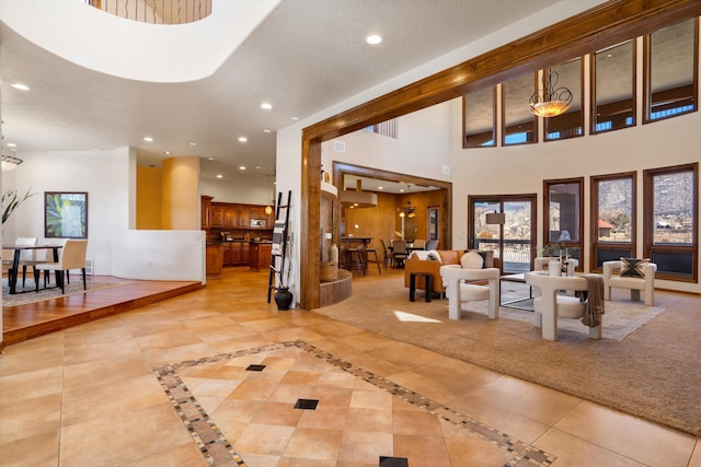 dining area featuring recessed lighting, visible vents, a textured ceiling, and wood finished floors