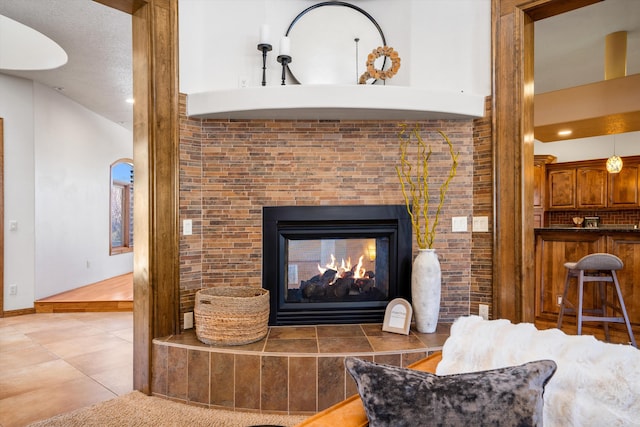 room details with a tiled fireplace