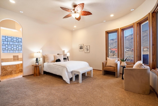 bedroom featuring baseboards, a ceiling fan, connected bathroom, light colored carpet, and recessed lighting