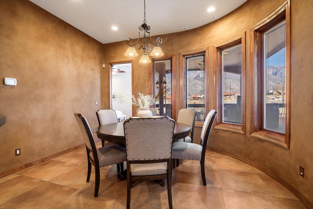 dining room featuring recessed lighting, a notable chandelier, baseboards, and light tile patterned floors