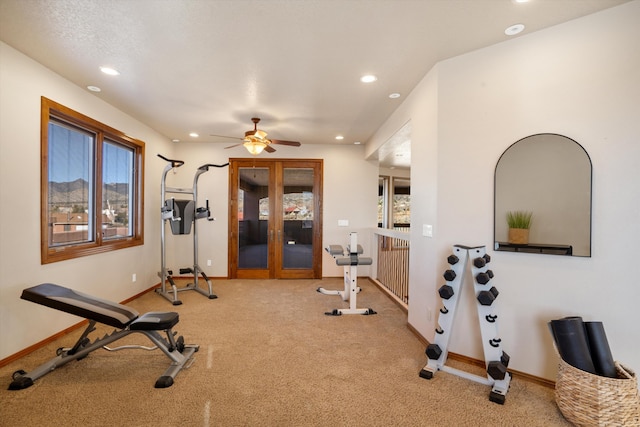 exercise room featuring baseboards, carpet flooring, a wealth of natural light, and recessed lighting