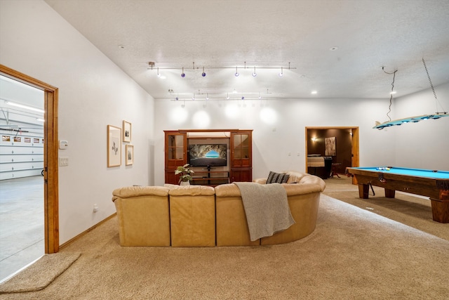 living room featuring light carpet, track lighting, billiards, and baseboards