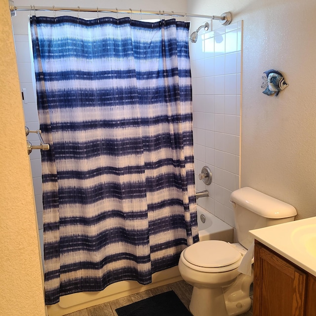 full bathroom with toilet, vanity, and shower / bathtub combination with curtain