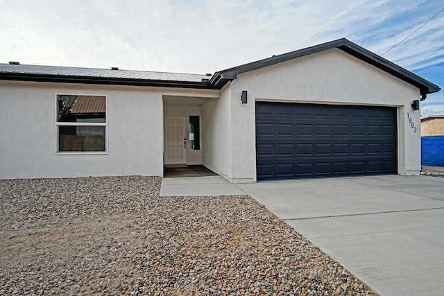 ranch-style home with a garage