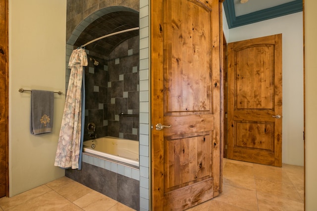 bathroom featuring shower / bath combo and crown molding