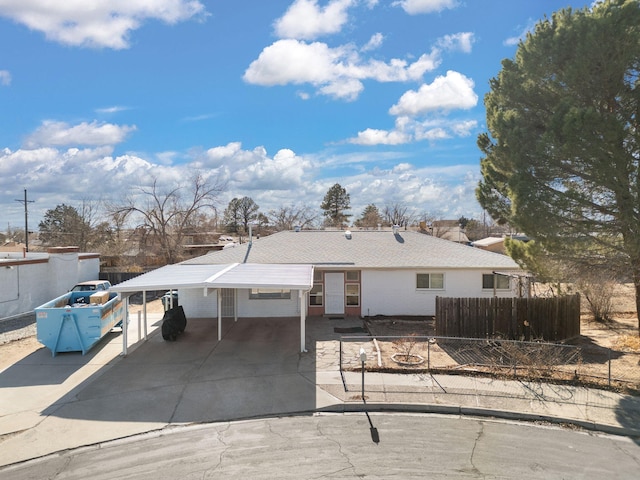 view of front of house with a carport