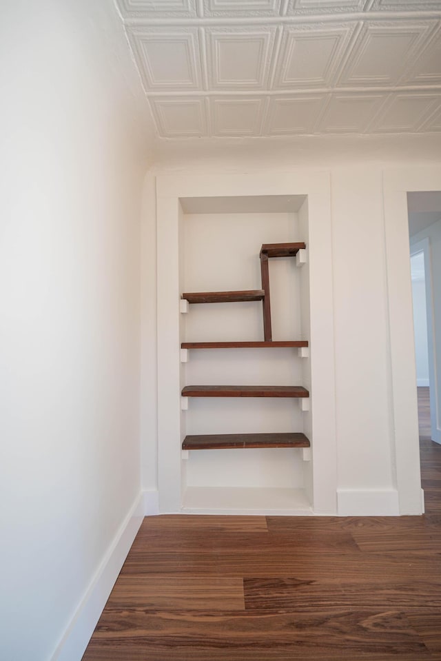 staircase featuring hardwood / wood-style flooring