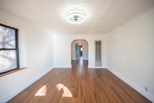 unfurnished room with hardwood / wood-style floors