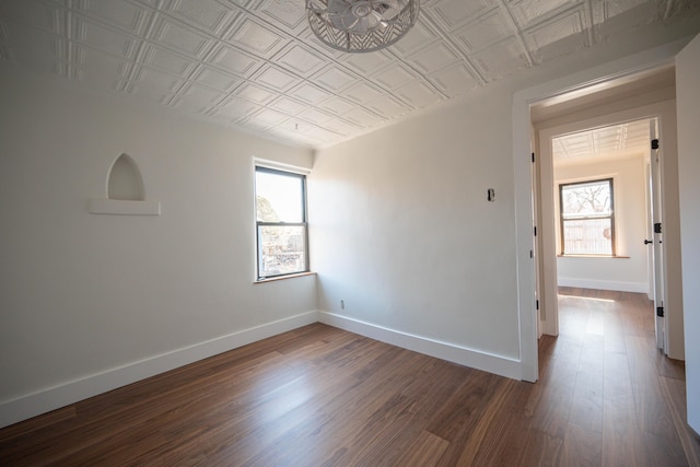 empty room featuring dark hardwood / wood-style floors