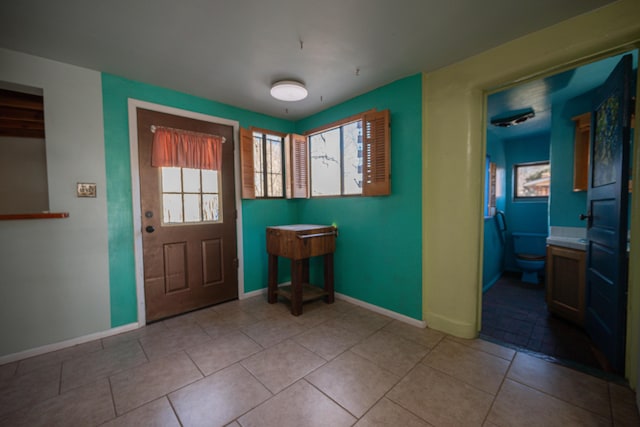 view of tiled foyer entrance