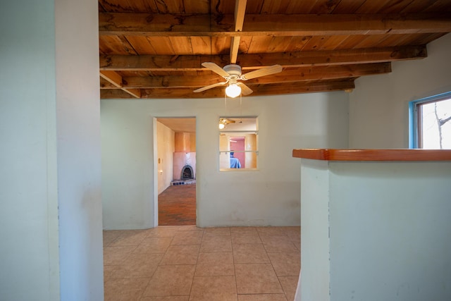 hall with beam ceiling and wood ceiling