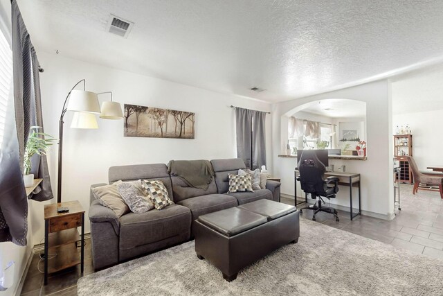 kitchen featuring sink, a breakfast bar area, a center island, stainless steel appliances, and backsplash