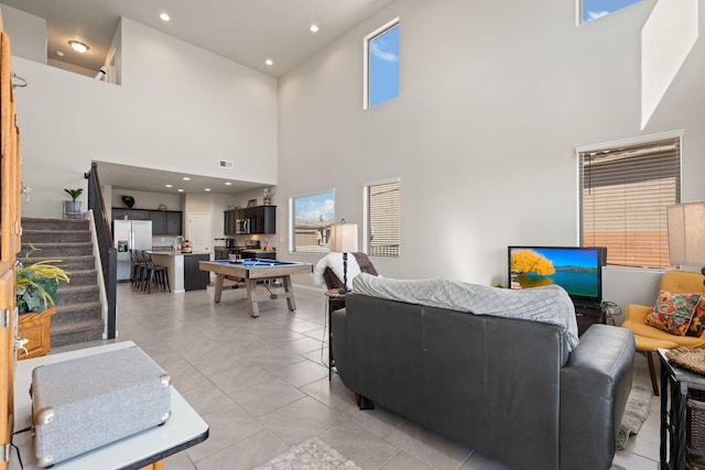 tiled living room featuring billiards