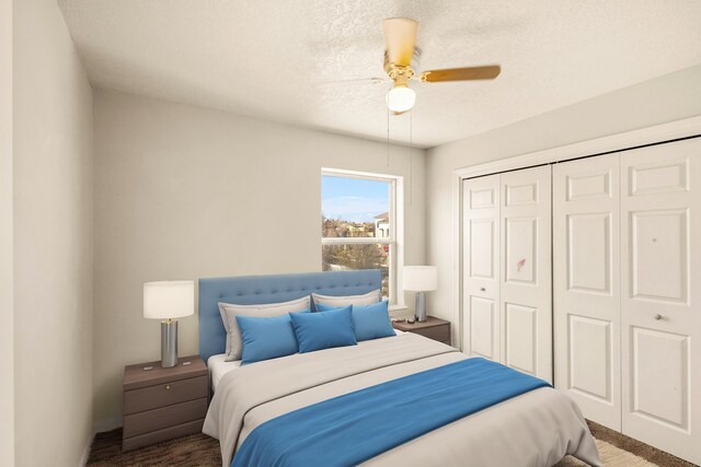 carpeted bedroom with a ceiling fan, a closet, and a textured ceiling