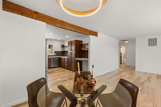 dining room featuring light wood-type flooring