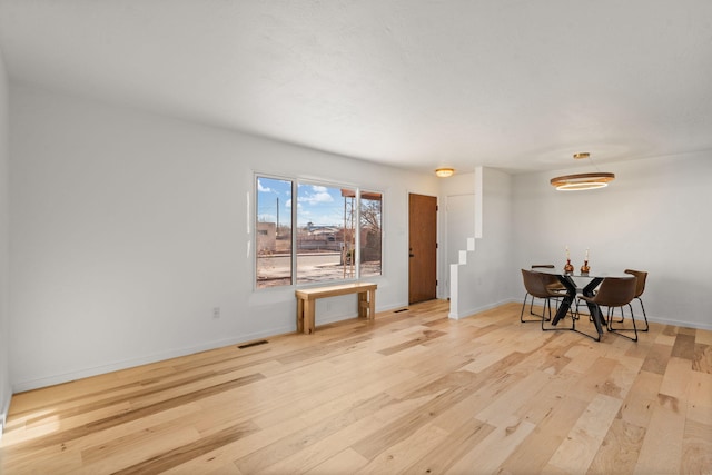 dining room featuring light hardwood / wood-style flooring