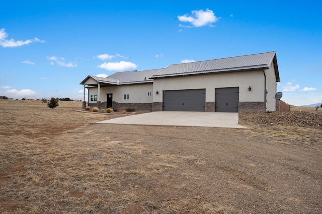 view of front of house with a garage