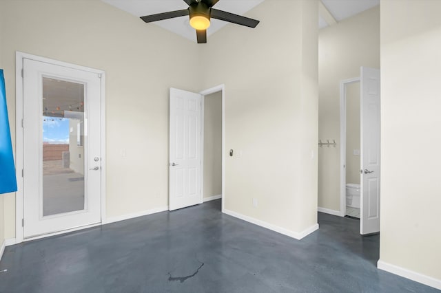 unfurnished bedroom featuring ceiling fan