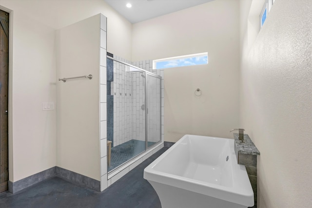 bathroom featuring plus walk in shower