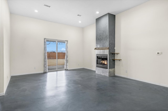 unfurnished living room featuring a fireplace