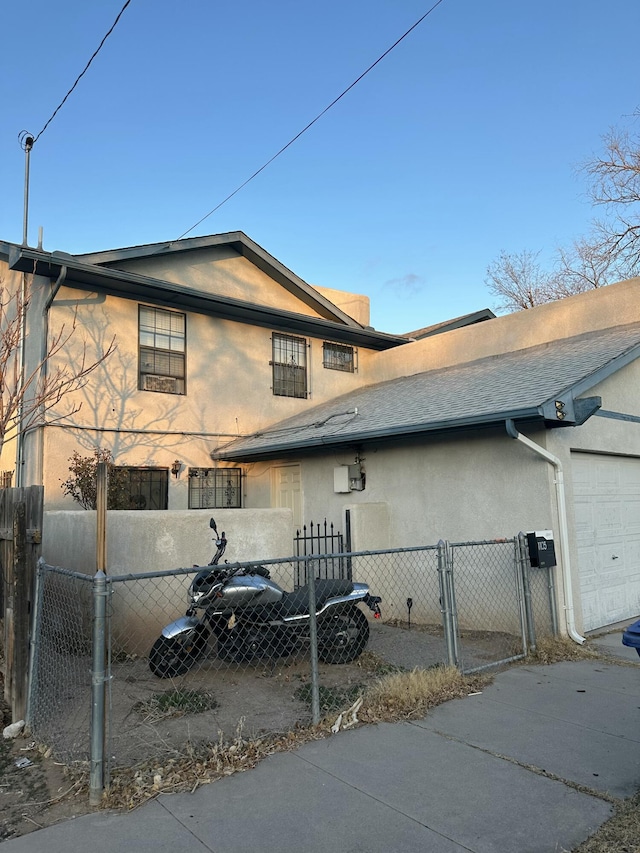 view of property exterior featuring a garage