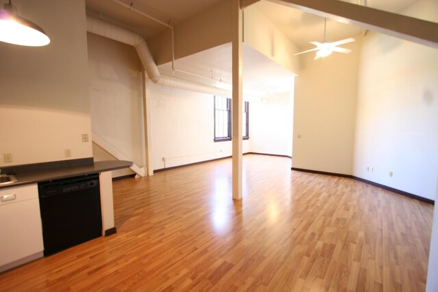 empty room featuring hardwood / wood-style flooring and ceiling fan