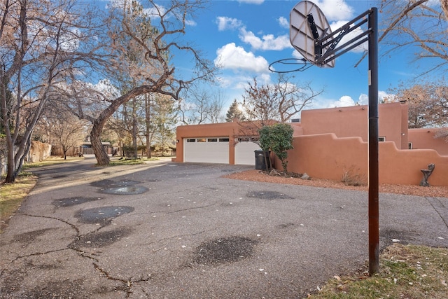 exterior space with a garage