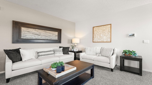 living room featuring light carpet and a textured ceiling