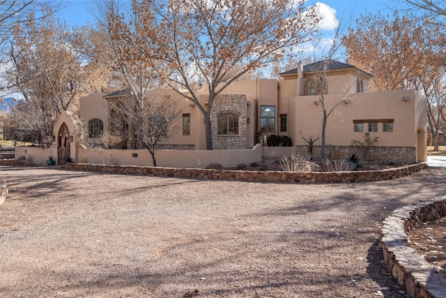 view of pueblo revival-style home