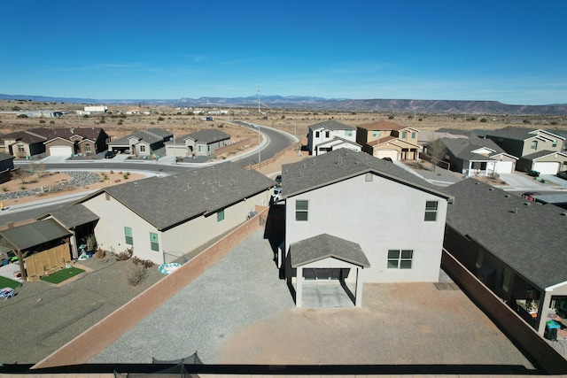 drone / aerial view featuring a mountain view