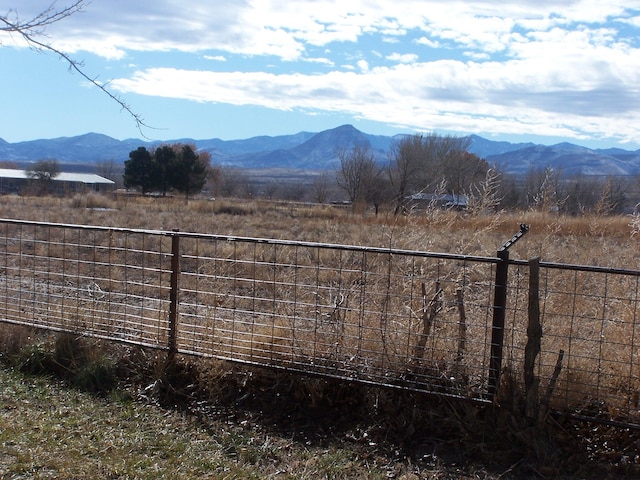 view of mountain feature featuring a rural view