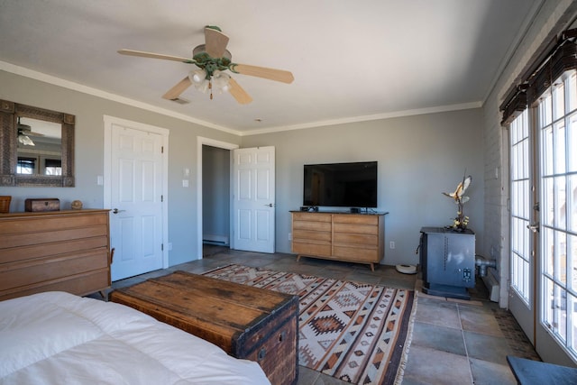 bedroom with ornamental molding and ceiling fan